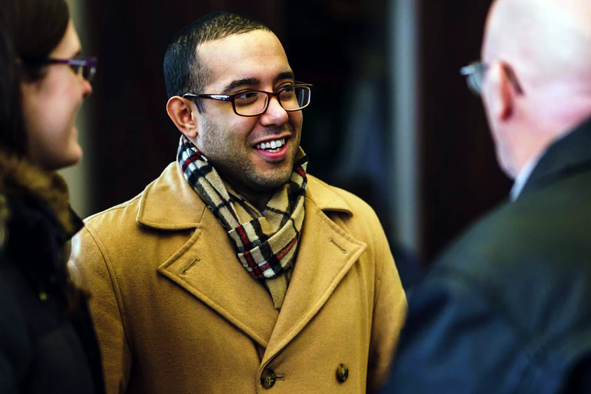 Young woman running a video camera. Young woman running a video camera.