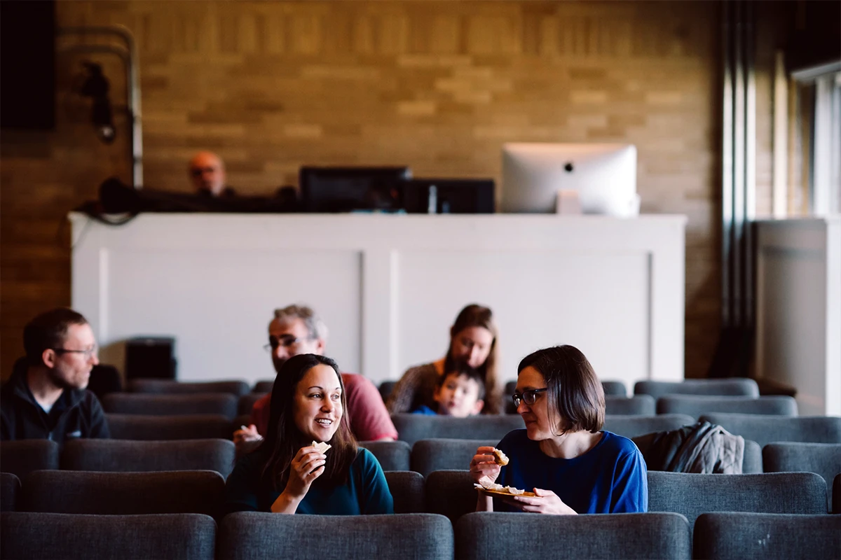 Young woman running a video camera. Young woman running a video camera.